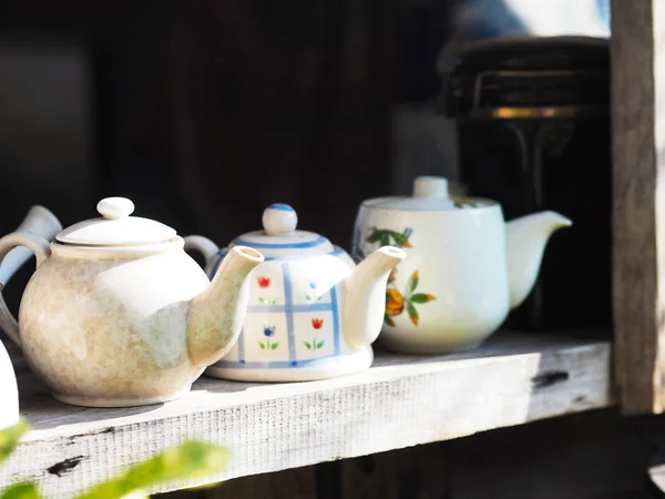 Vintage tea pot on old wooden table. — Stockfoto