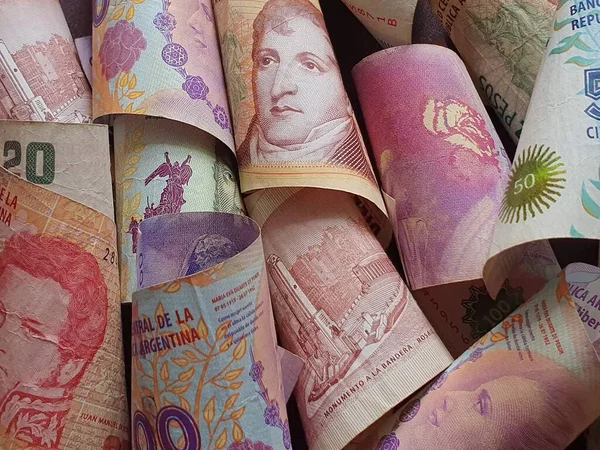 Economía y finanzas con dinero argentino — Foto de Stock