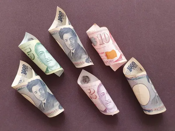 Kurs wymiany pieniądza singaporeańskiego i japońskiego — Zdjęcie stockowe