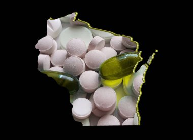 Wisconsin haritası ilaç hapları ve siyah arkaplan ile