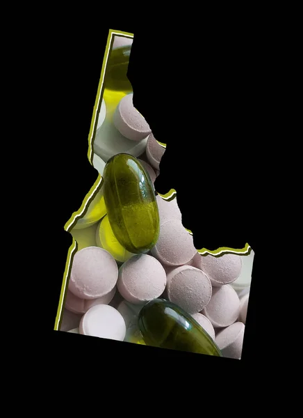 Mapa Státu Idaho Medicínskými Pilulkami Černým Pozadím — Stock fotografie