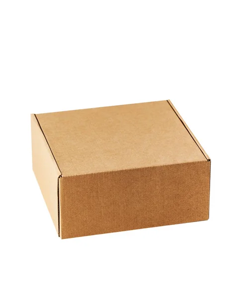 Kraft karton kwadratowy zamknięte pole widok z góry. Pudełko jest wyryte na białym tle.. — Zdjęcie stockowe