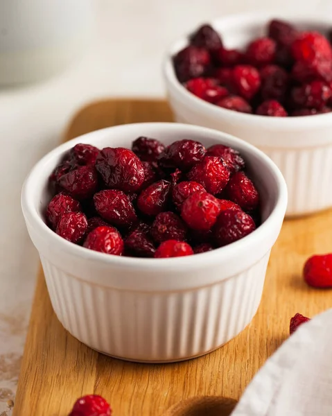 Candied cranberries, dried cranberries close-up. The right snack, sweets for vegetarians.