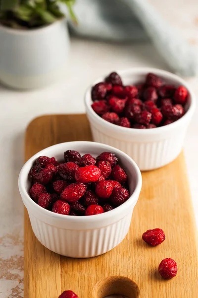 Candied cranberries, dried cranberries close-up. The right snack, sweets for vegetarians.