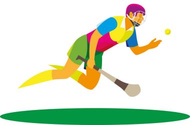 Çim hokeyi sonbaharda İrlandalı oyuncu topu yakalar