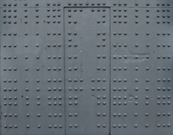 Placa metálica con remaches, fondo textural — Foto de stock © Eillen