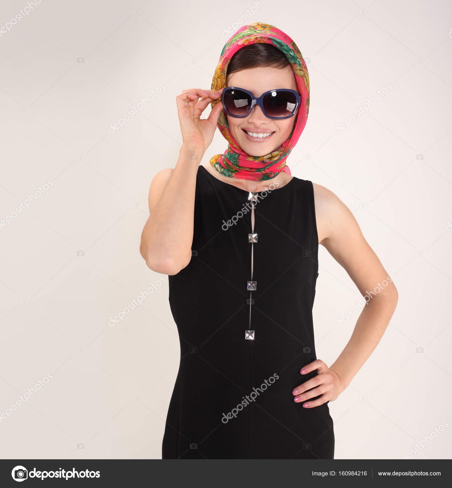 headscarf and sunglasses