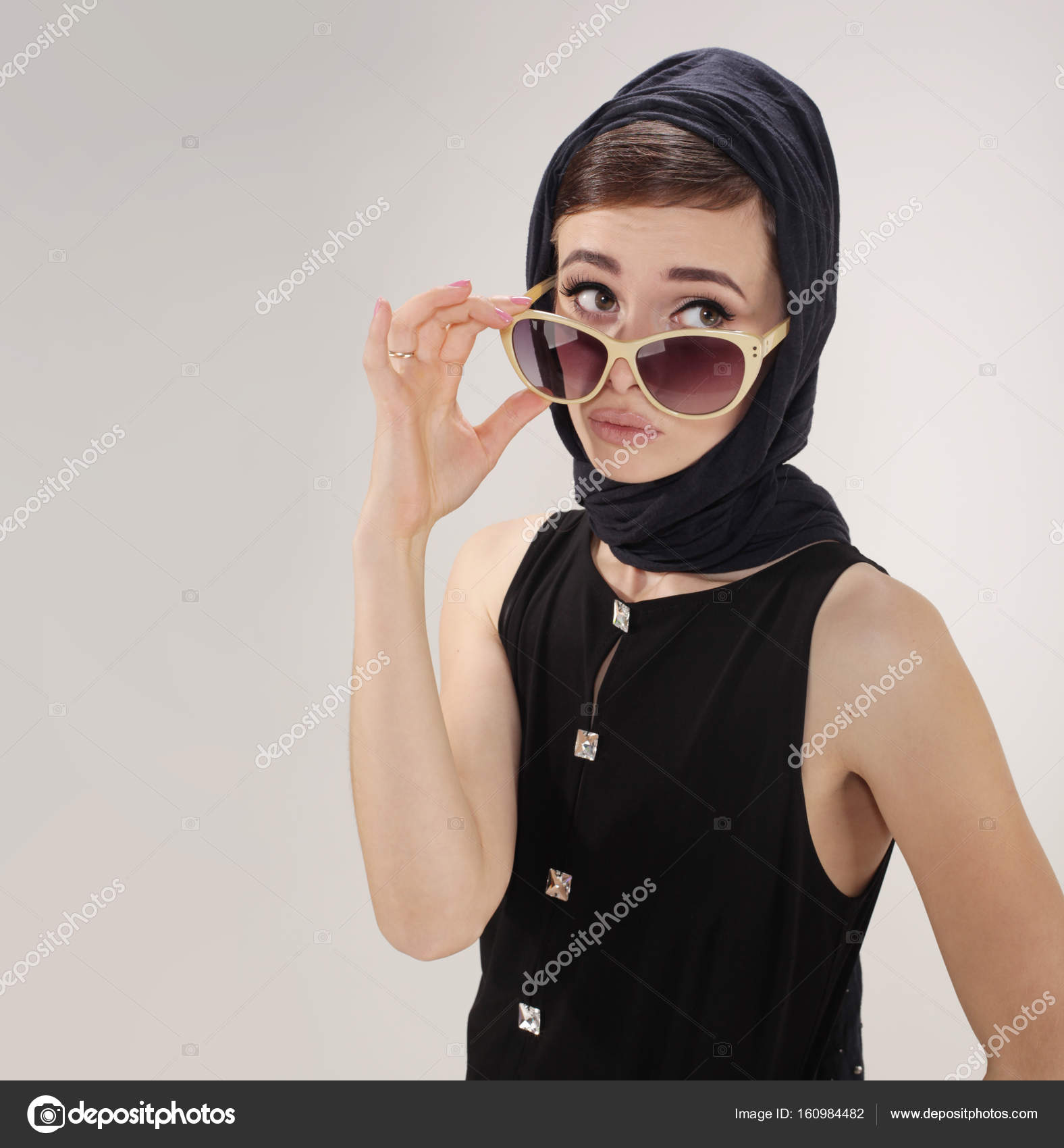 headscarf and sunglasses