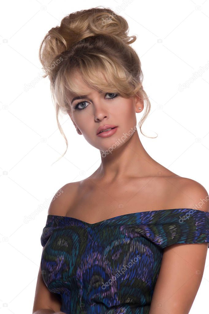 portrait of a beautiful blonde woman in retro dress 50-s style . copy space. vintage look. babetta haircut