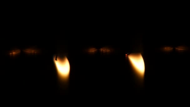 Candles with reflections. Close up — Stock Video