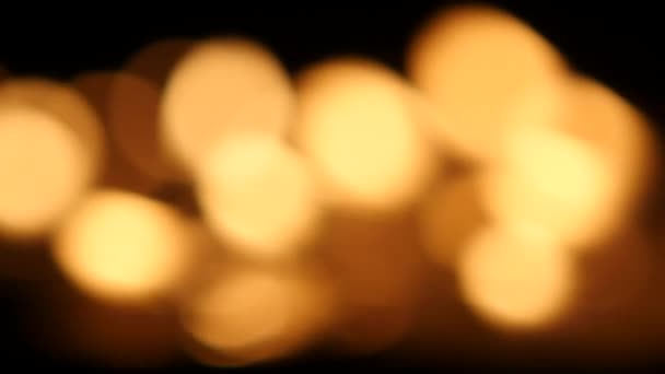 Velas de fundo desfocadas. Bokeh... — Vídeo de Stock