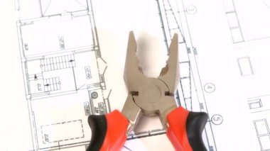 Bina planı, düzeni, döndürme, gri ve kırmızı pense yakın çekim