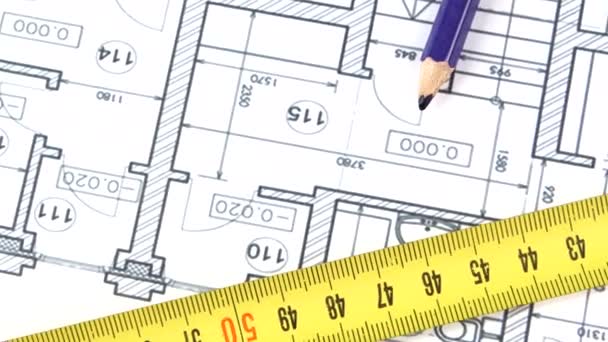 Architectural plan, blue pencil and roulette, rotation, close up — Stock Video