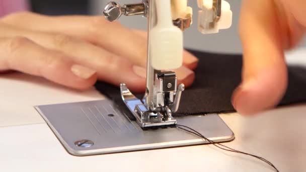 Sew stitch on the sewing machine. Close up — Stock Video