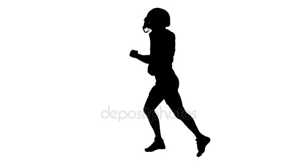 Atlet běží s míčem a v podobě fotbal. Silueta, bílý backgraund — Stock video