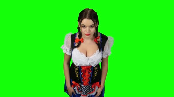 Happy girl in costume at Oktoberfest laughs and wonders. Green screen — Stock Video