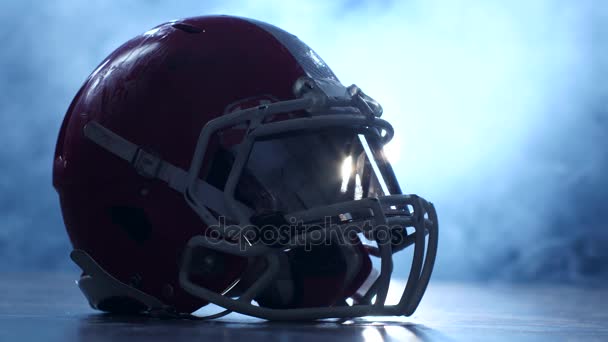 Helmet american football players in the smoke background. Clous up — Stock Video