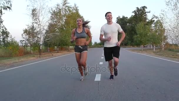 Jog around young people. Sport is health. Slow motion — Stock Video
