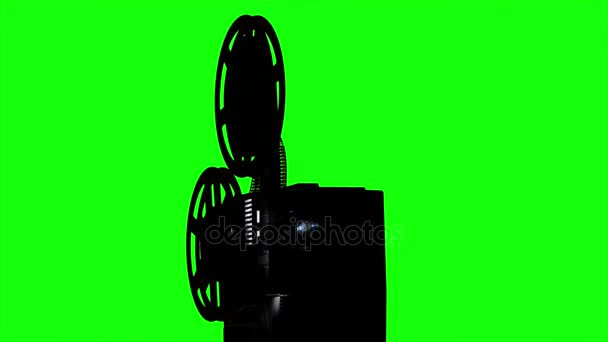 Old projector turns the tape. Studio green screen — Stock Video