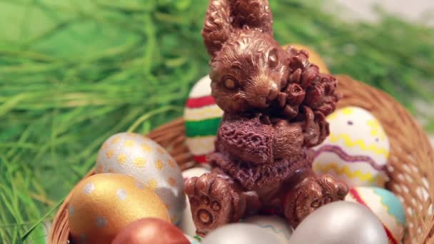 Chocolate rabbit among Easter eggs