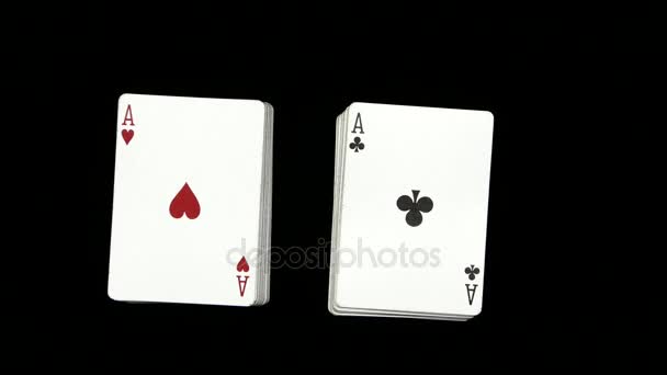 Playing cards being shuffle, on a black surface by magician, close up — Stock Video