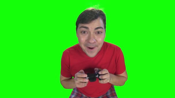 Emoções no rosto do jogador enquanto joga no gamepad — Vídeo de Stock