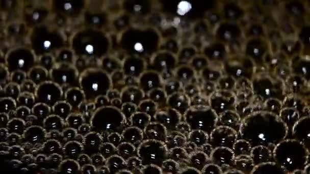 Foam bubbles on black coffee. Closeup — Stock Video