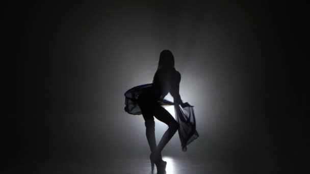 PJ girl dancer in studio with smoke against black background — Stock Video