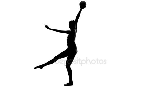 Gymnast to be turned with the ball in his hands. White background. Silhouette. Slow motion — Stock Video