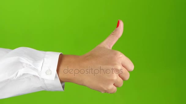 Thumb up and then thumb down. Woman hand, sign language — Stock Video