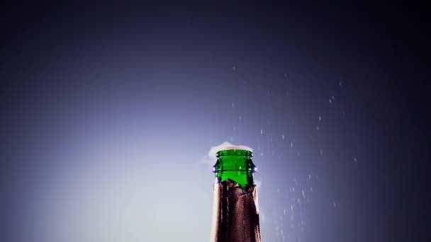 Bottle champagne wine is opened. Slow motion, lit background — Stock Video