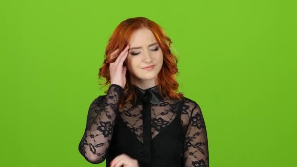 Girl has a headache, pressure pulsates in the temples. Green screen — Stock Footage Girl has a headache, pressure pulsates in the temples. Green screen Stock Footage