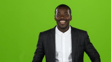 Afro-Amerikan harika adam, onun bir gülümseme her şeyin üstesinden gelir ve kahkaha bulaşıcıdır. Yeşil ekran
