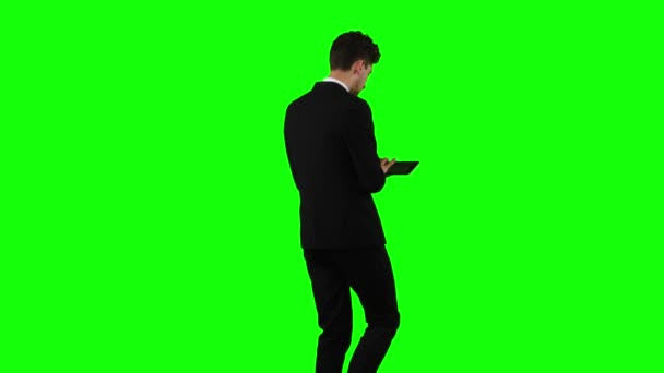 Man is going to work and prints important messages. Green screen — Stock Video