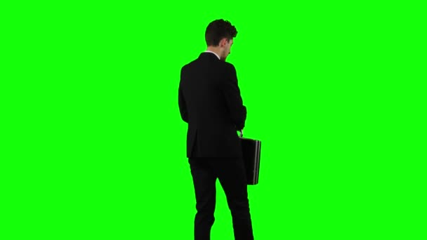 Adam işe gider, bir diplomat ile o elini başkalarına dalgaları. Yeşil ekran — Stok video