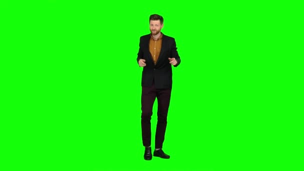 Man dances, flirts, winks, and there are eyes. Green screen — Stock Video