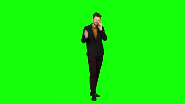 Businessman talking on the phone and nervous, shouts. Green screen — Stock Video