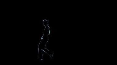 Brakedance siyah arka plan üzerine, bilgisayar grafikleri adam yapın. Ağır çekim