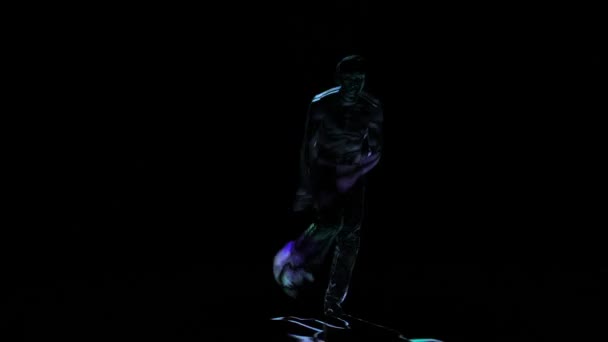 Contour néon casseur homme effectue sur fond noir. Traitement informatique 