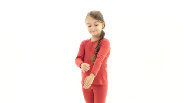 Child advertises clothes. White background — Stock Video