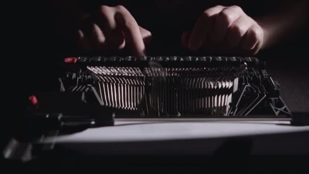 Poet types the text of the poem on a retro typewriter — Stock Video