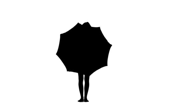 Woman with an umbrella in her hands is talking on the phone. White background. Silhouette — Stock Video