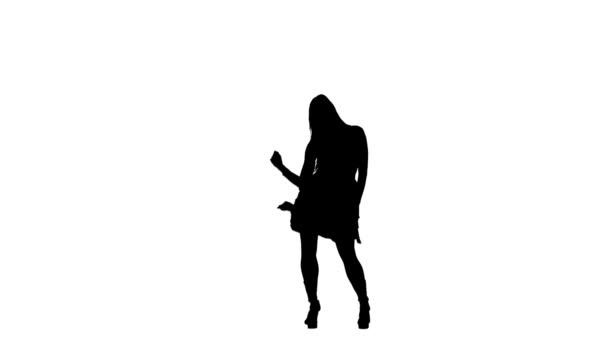 Girl in high heels dancing at a disco. Silhouette. White background — Stock Video