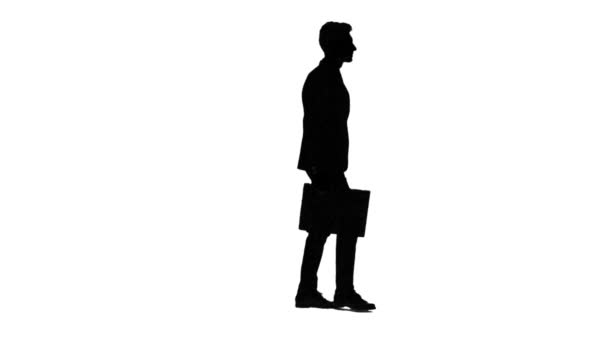 Man is going to a negotiation, he has a diplomat in his hands. White background. Silhouette — Stock Video