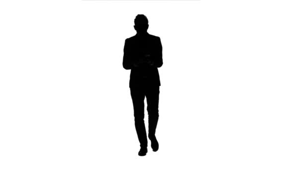 Businessman is going to work and prints important messages. White background. Silhouette — Stock Video