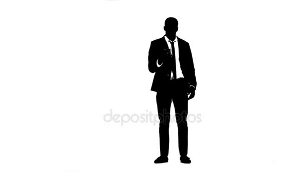 Businessman talking on the phone and waving. White background. Silhouette — Stock Video