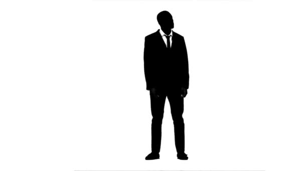 African american looks around and waits for partners. White background. Silhouette — Stock Video
