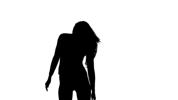 Anmutige und sexy Mädchenbewegungen. Silhouette. weißer Hintergrund. Zeitlupe — Stockvideo