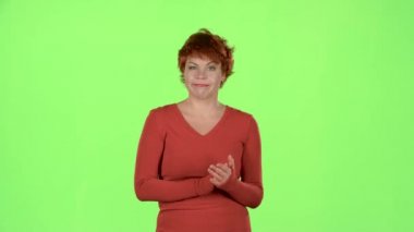 Redhaired kadın tiyatro gürlemesi ve aktörler oyun hoşlanmıyor. Yeşil ekran