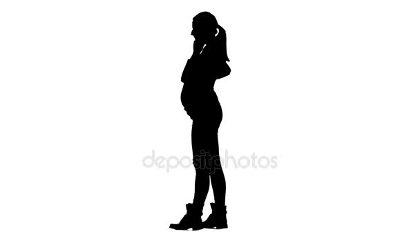 Έγκυος κορίτσι μιλάει στο τηλέφωνο. Σιλουέτα. Λευκό φόντο. Αργή κίνηση — Αρχείο Βίντεο